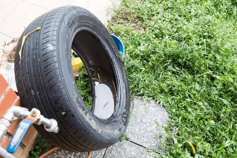 standing water trapped in tire and containers