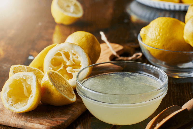 a bowl full of freshly squeezed lemon - Natural Ways to Get Rid of Ants