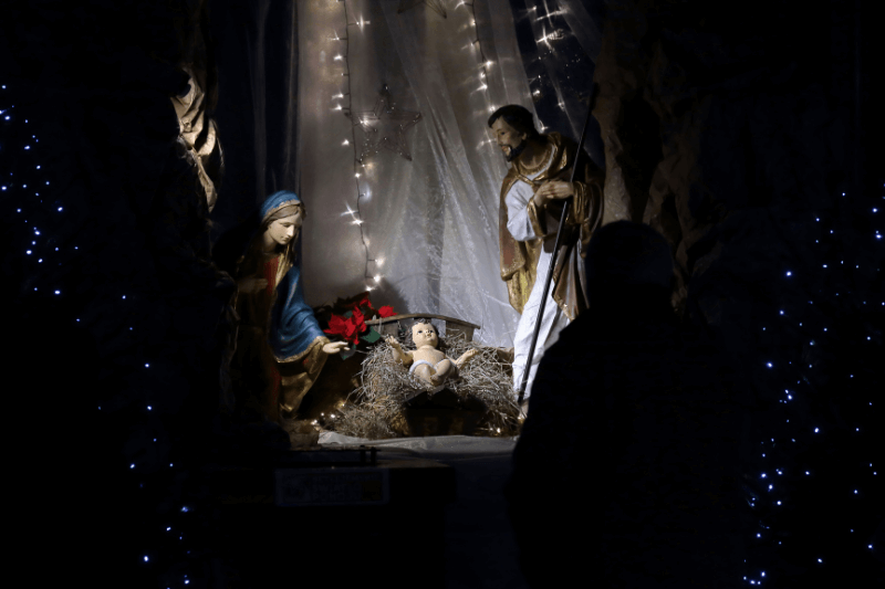 the birth of Jesus scene with a baby a manger