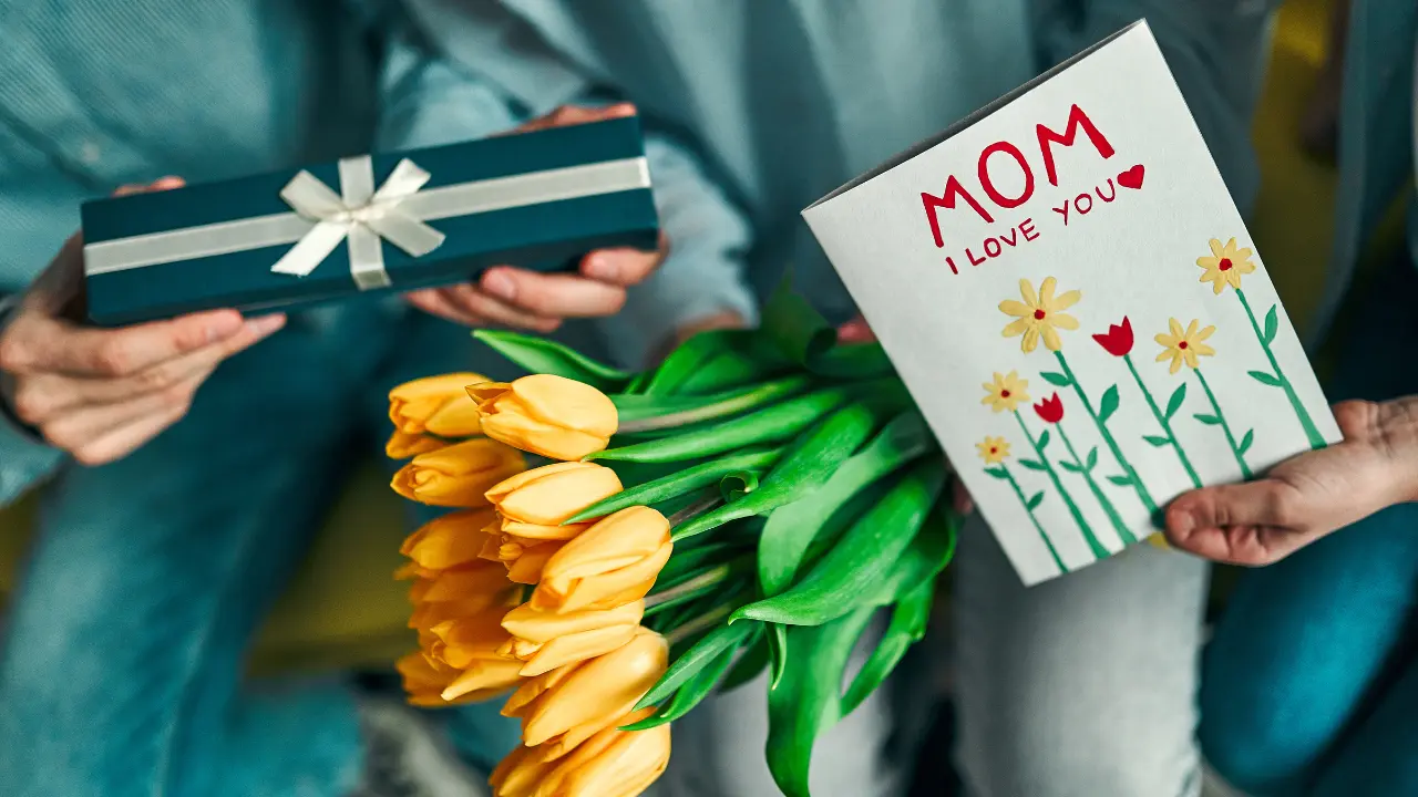 celebrating mother's day with gifts and flowers.