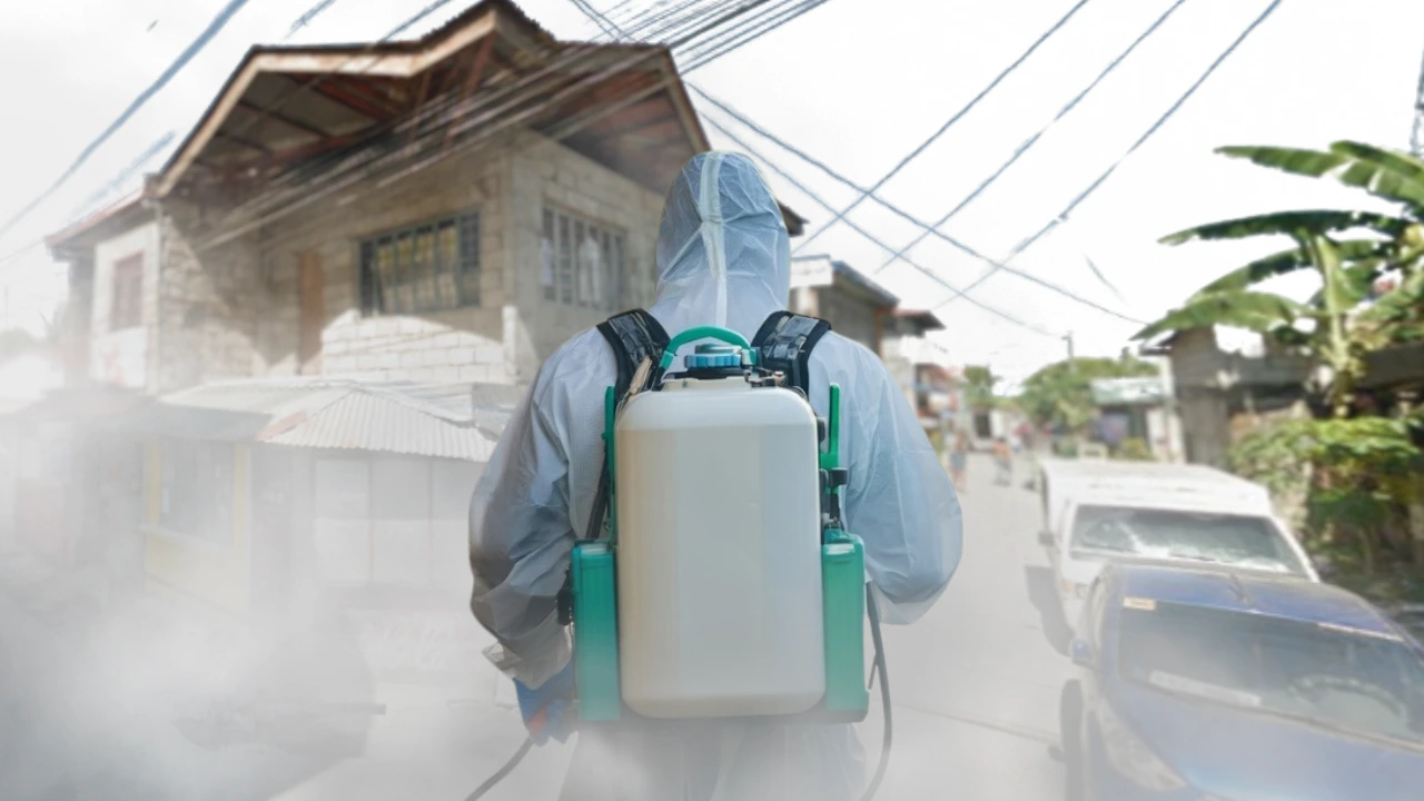 a technician ready to help in eliminating the dengue outbreak