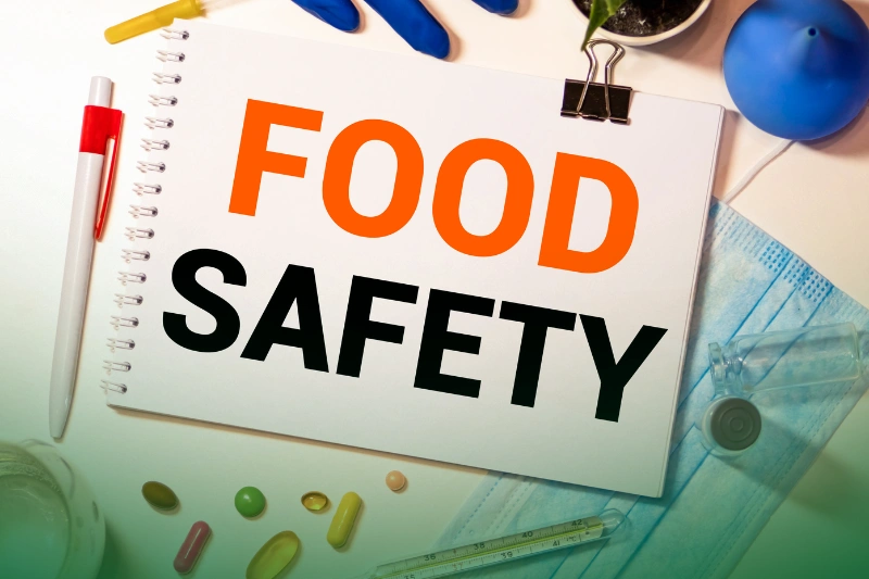 Cooking and Food Safety a notepad with text on it next to medical gloves and thermometer