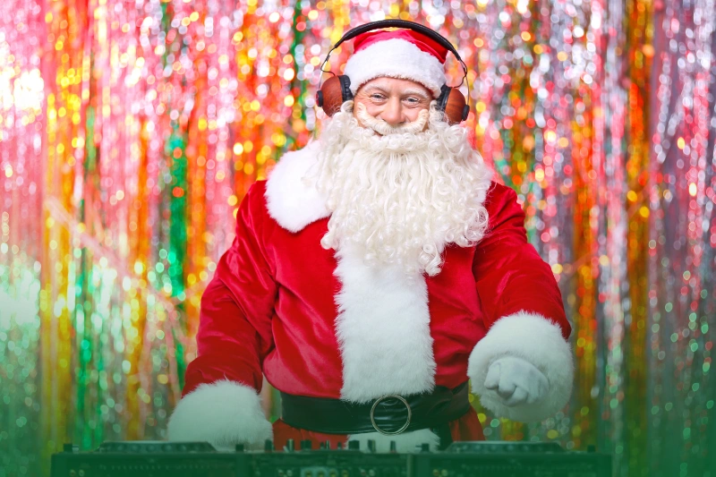 Holiday Music and Entertainment a person wearing a santa garment and headphones for ber months home tips