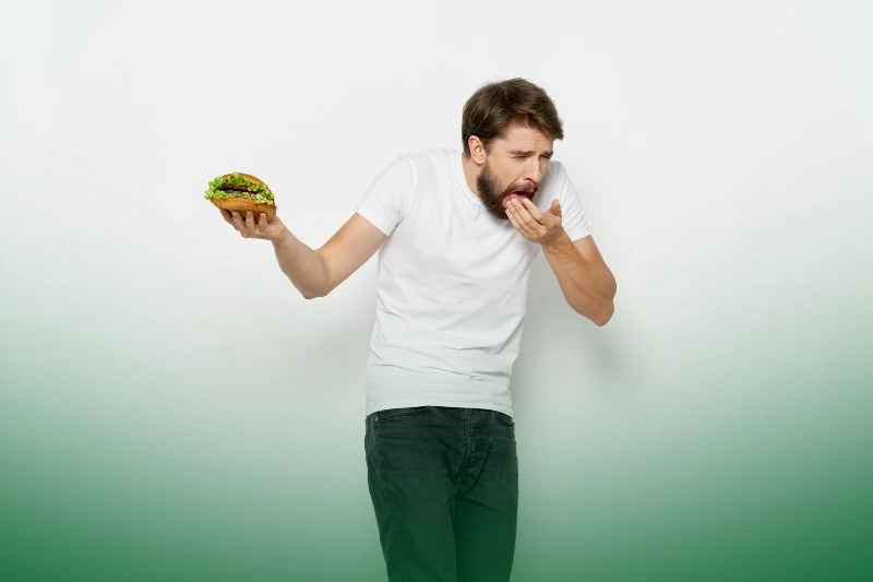 Mitigating Health Risks a man eating a pest-contaminated burger