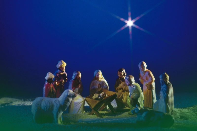 the birth of Jesus scene with a baby a manger
