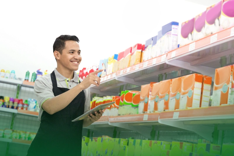 Supermarket Owners happy young supermarket owner doing product inventory