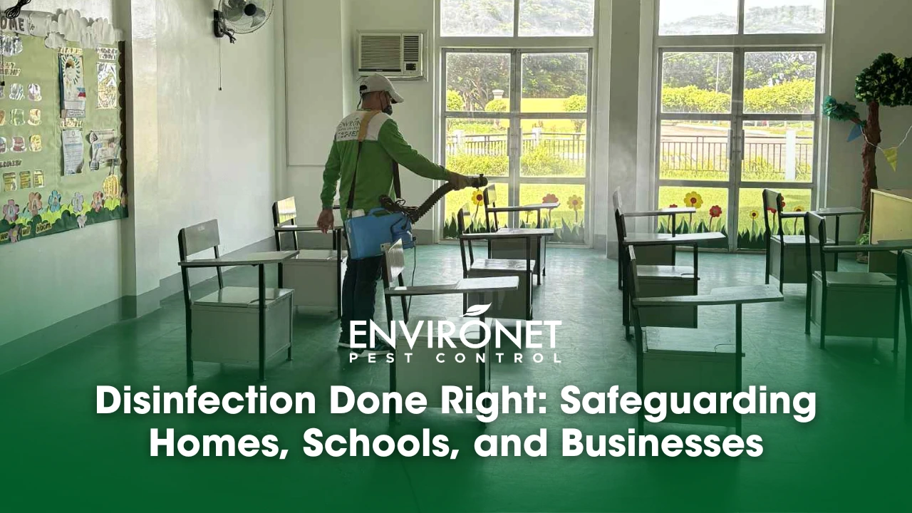 A technician disinfecting a classroom